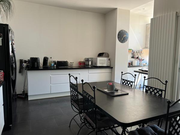 Appartement T3 de standing de 115 m² en plain pied avec terrasse et jardin privatif