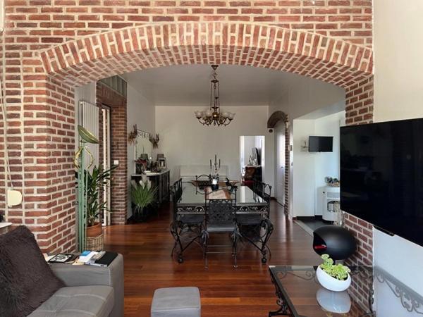 Appartement T3 de standing de 115 m² en plain pied avec terrasse et jardin privatif