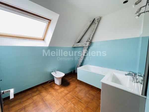 Maison en pierres avec jardin