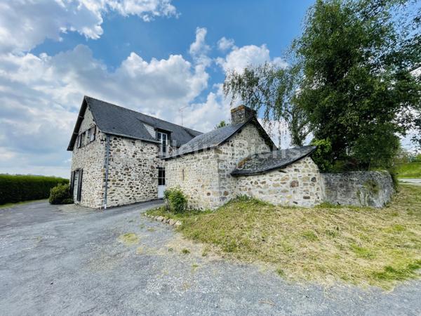 Maison en pierres avec jardin