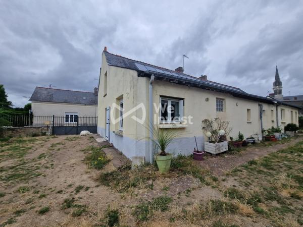 Grande maison de bourg avec jardin, grange et garage