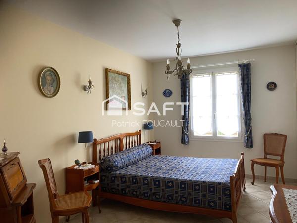 Maison Plain Pied + double garage sur terrain clos