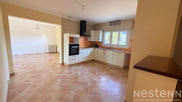 Maison familiale en centre de Pluvigner avec 4 chambres et terrain constructible de 2 250 m²