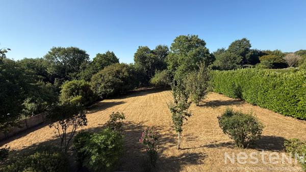 Maison familiale en centre de Pluvigner avec 4 chambres et terrain constructible de 2 250 m²