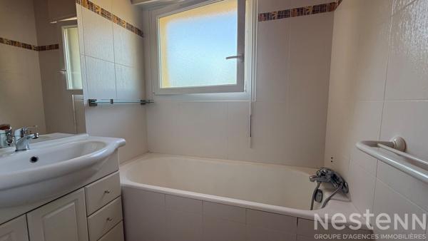 Maison familiale en centre de Pluvigner avec 4 chambres et terrain constructible de 2 250 m²