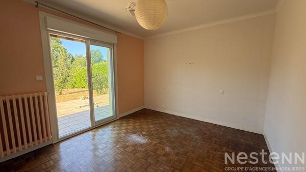 Maison familiale en centre de Pluvigner avec 4 chambres et terrain constructible de 2 250 m²