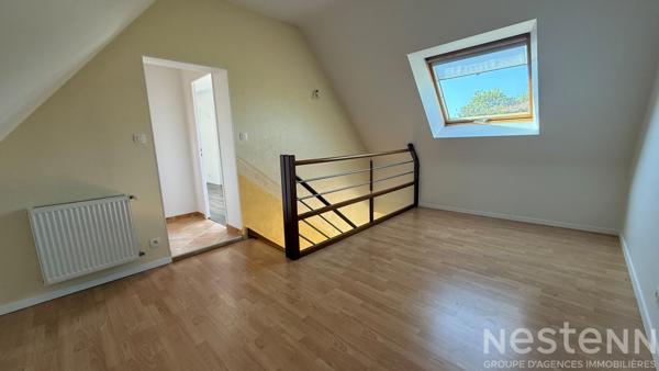Maison familiale en centre de Pluvigner avec 4 chambres et terrain constructible de 2 250 m²