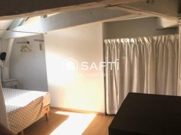 CHOLET HYPERCENTRE – 35,77 M² DE CHARME SOUS LES POUTRES
