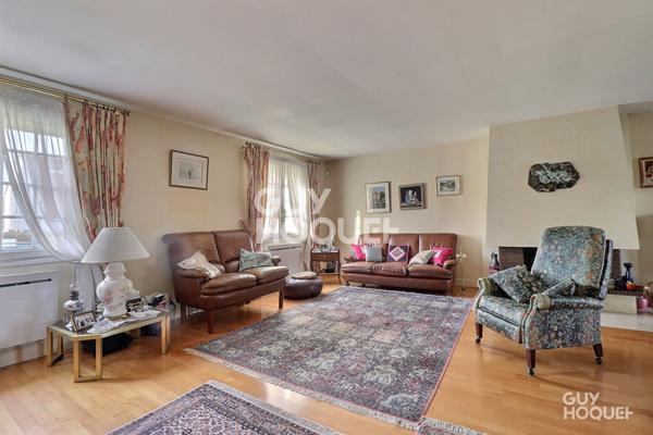 En vente une maison individuelle 6 pièces 127 m2, garage double, jardin arboré