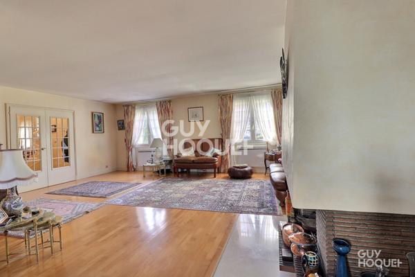 En vente une maison individuelle 6 pièces 127 m2, garage double, jardin arboré