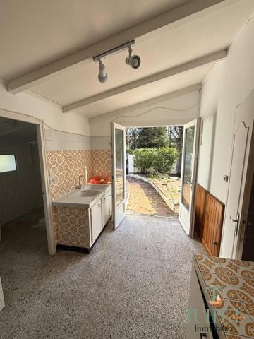 Maison plain-pied avec garage - 1 km du centre- Annexe de 28 m2 Potentiel Locatif