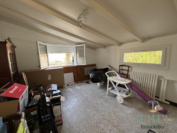 Maison plain-pied avec garage - 1 km du centre- Annexe de 28 m2 Potentiel Locatif