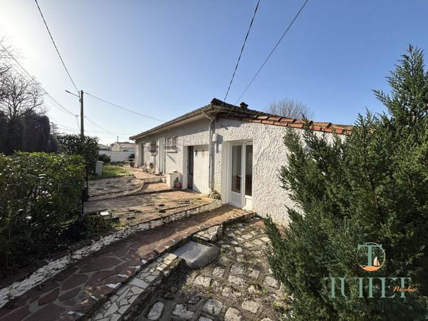 Maison plain-pied avec garage - 1 km du centre- Annexe de 28 m2 Potentiel Locatif