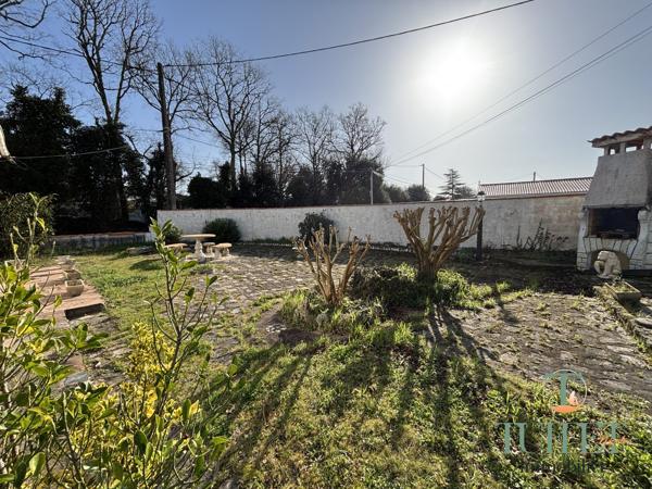 Maison plain-pied avec garage - 1 km du centre- Annexe de 28 m2 Potentiel Locatif