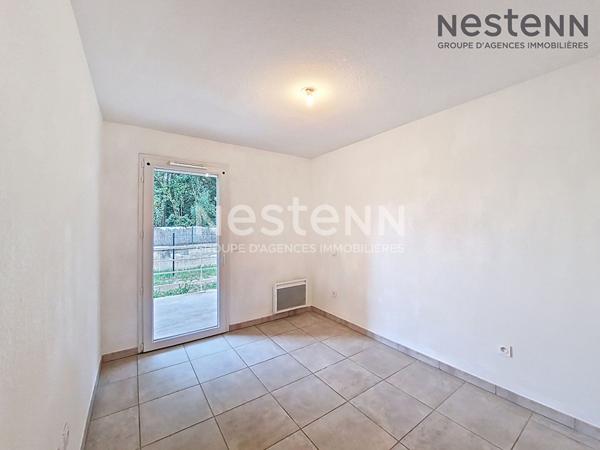 Appartement 3 pièces de 62 m2 en rez de jardin à Lunel