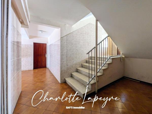 Proche des commodités, RDC surélevé T4 traversant