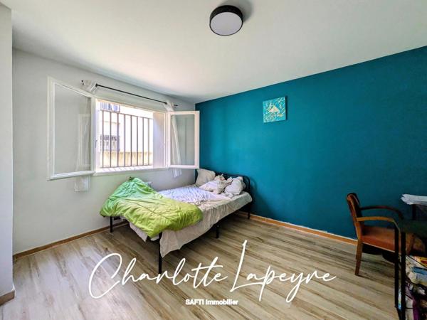 Proche des commodités, RDC surélevé T4 traversant