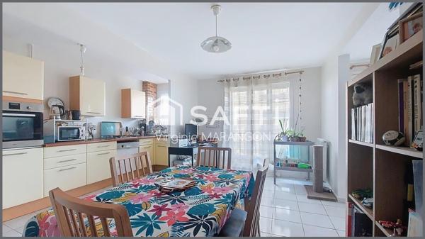 Appartement type F4 lumineux avec balcon et parking.