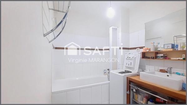 Appartement type F4 lumineux avec balcon et parking.