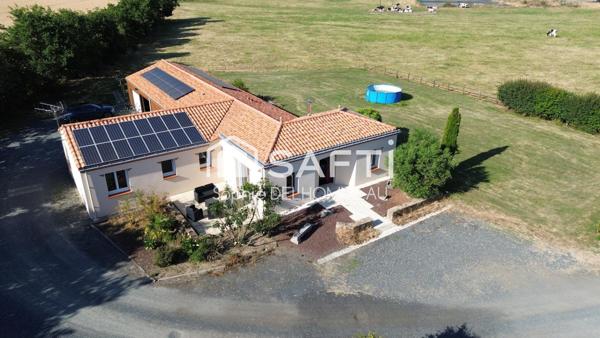 Maison familiale de plain pied,150m2, 4 chambres, sur un magnifique terrain de 2700m2 à seulement 2kms de Montaigu !