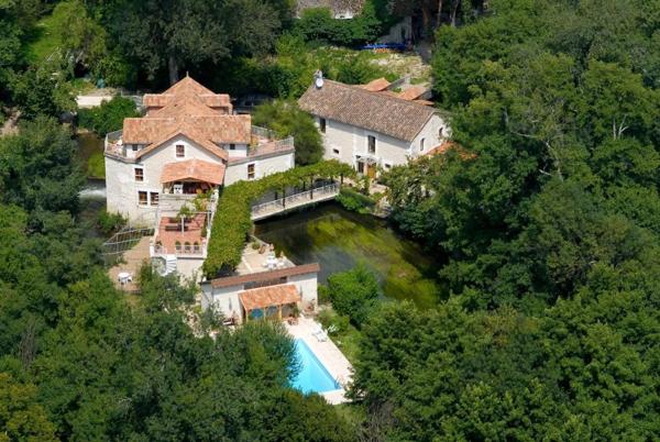 Extraordinaire propriété comprenant un moulin et trois suites de luxe indépendantes