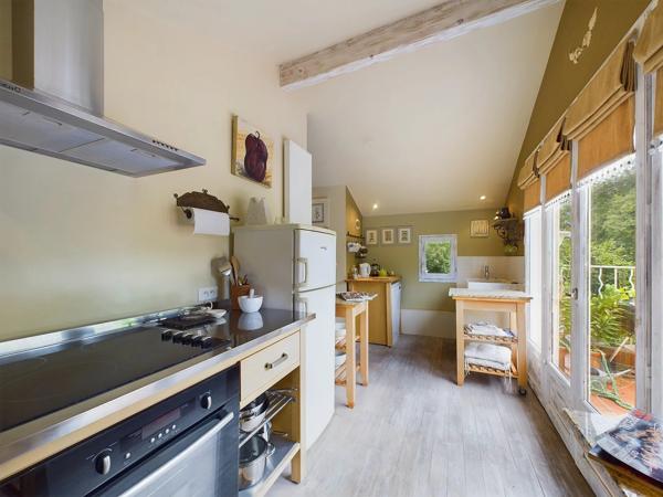 Extraordinaire propriété comprenant un moulin et trois suites de luxe indépendantes