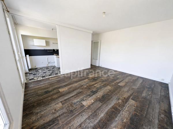 Appartement F3 avec loggia et parking - proche commerces et gare