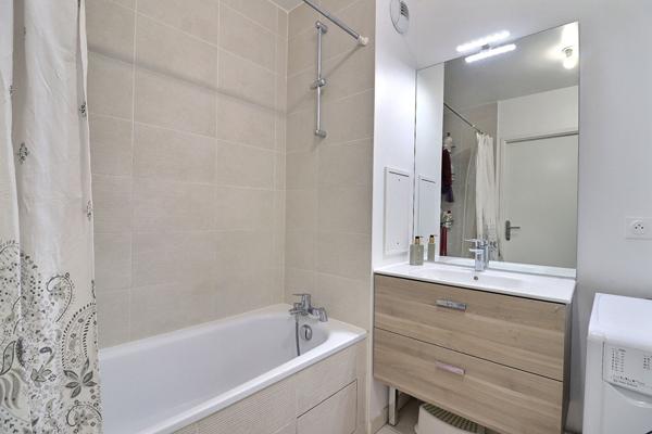 Appartement 3 pièces 59m² + place de parking en sous-sol