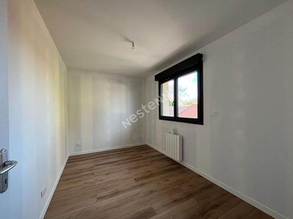 Centre village- Appartement 2 chambres- Balcon- Stationnement