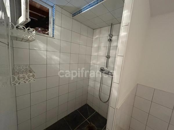 Maison de bourg à vendre 4 pièces env 211m² EXCIDEUIL (24)patio et jardin