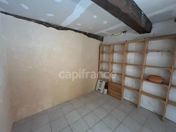 Maison de bourg à vendre 4 pièces env 211m² EXCIDEUIL (24)patio et jardin