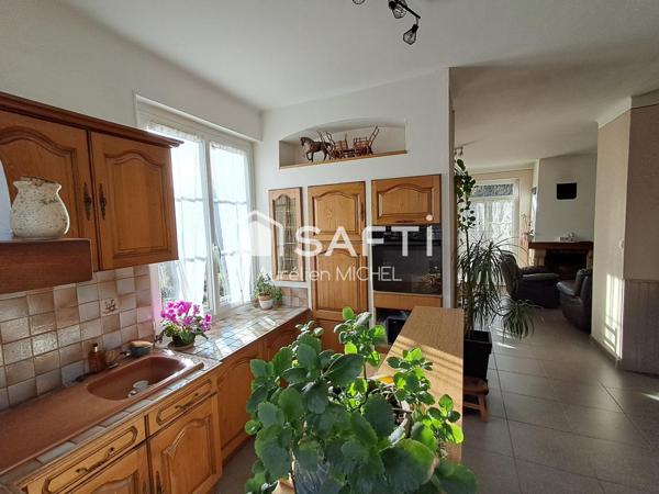 GRANDE MAISON FAMILIALE AVEC POTENTIEL DE DEVELOPPEMENT