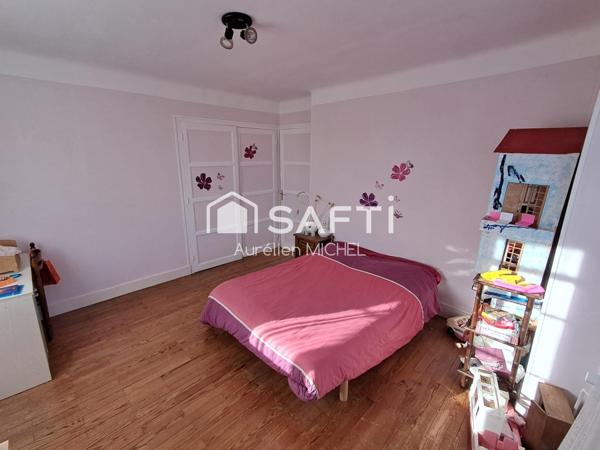 GRANDE MAISON FAMILIALE AVEC POTENTIEL DE DEVELOPPEMENT