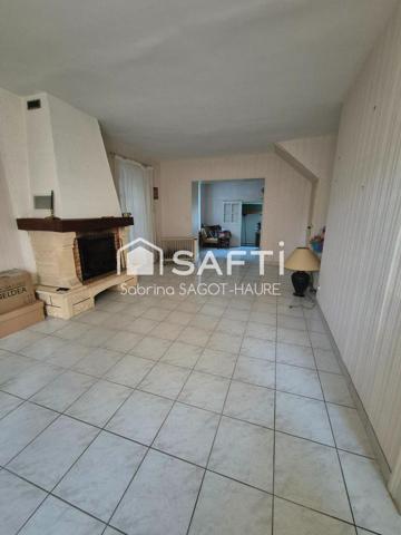 Maison avec garage et jardin