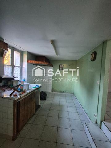 Maison avec garage et jardin