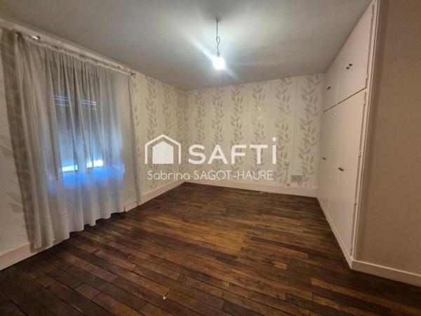 Maison avec garage et jardin