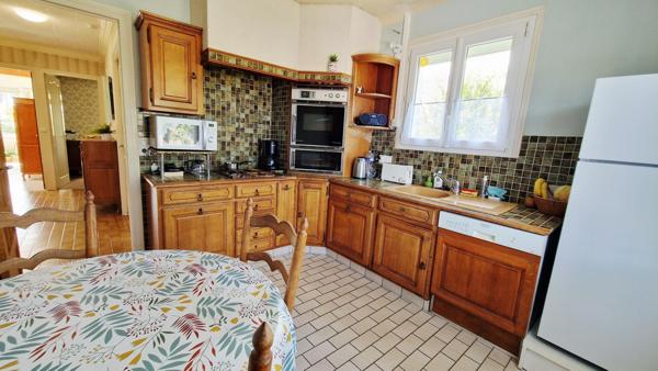 Maison de plain pied surélevée centre ville -100m2 - 3 chambres- terrain 820m2