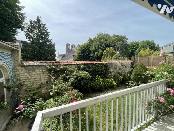 Appartement 6 pièces avec jardin, dépendance garage et cave 