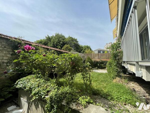 Appartement 6 pièces avec jardin, dépendance garage et cave 
