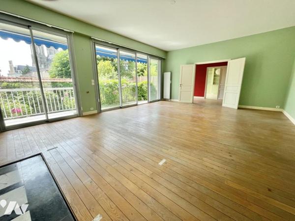 Appartement 6 pièces avec jardin, dépendance garage et cave 