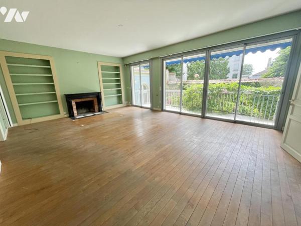 Appartement 6 pièces avec jardin, dépendance garage et cave 