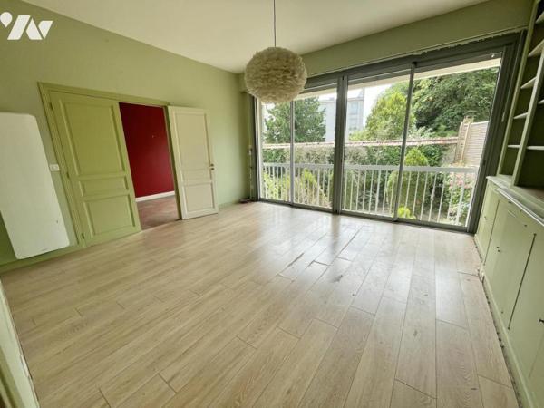Appartement 6 pièces avec jardin, dépendance garage et cave 