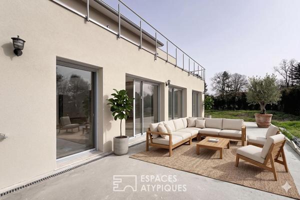 Maison neuve avec jardin et garage