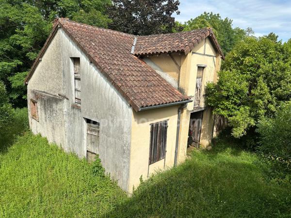 Maison de ville avec charme et caractère, spacieuse dépendance en pierre, jardin de 2000 M2.