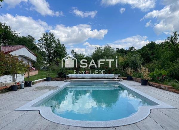 Maison de 4 pièces avec double garage et piscine