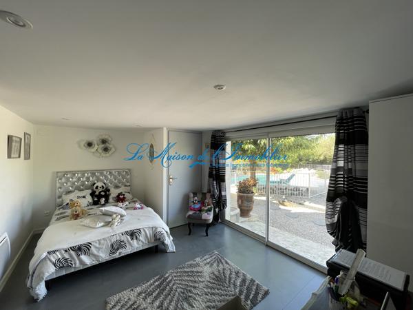 SAINT CHRISTOL LES ALES, en fond d'impasse, charmante villa de tpe F66 de 148 m² hab avec piscine et garage de