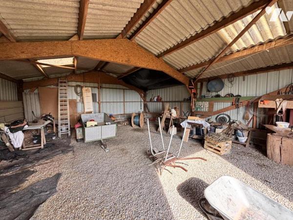 MAISON D'HABITATION AVEC TERRAIN D'ENVIRON 1HA30