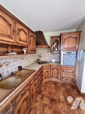 MAISON D'HABITATION AVEC TERRAIN D'ENVIRON 1HA30