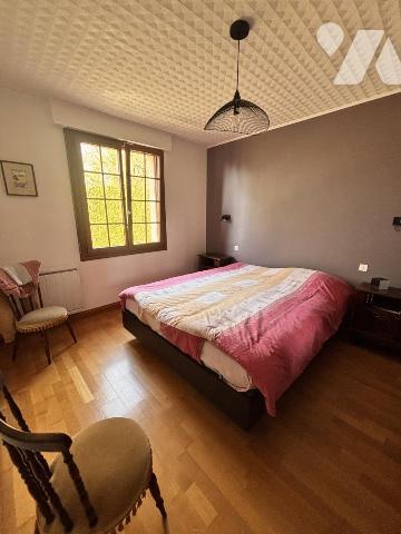 MAISON D'HABITATION AVEC TERRAIN D'ENVIRON 1HA30