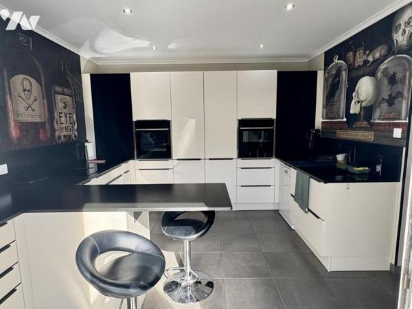 Maison à usage d'habitation 